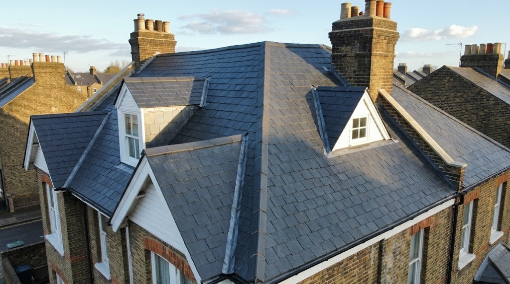 After photo showing a beautifully restored Welsh slate roof on a Hammersmith Victorian terrace by Obsidian Roofing
